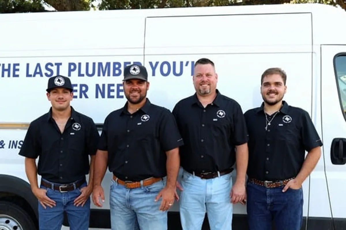 Front Range Plumbing service van and plumber ready for a call